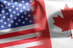 US and Canadian flags