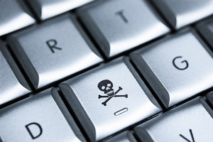Online piracy (skull and crossbones on keyboard)