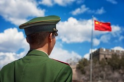 Chinese policeman with flag