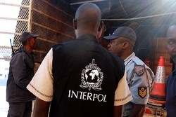 Interpol officers in action