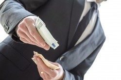 Man offering bribe Man offering bribe