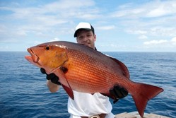 Proud fisherman with red snapper 