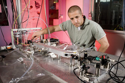 Researcher Ali Hussain in lab