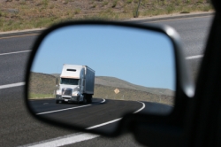 Truck in rearview mirror
