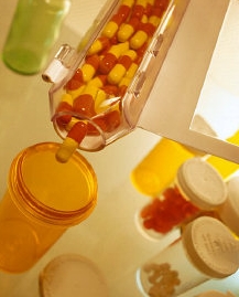 Pills being dispensed