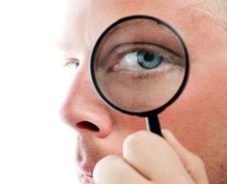 Man with magnifying glass Man with magnifying glass