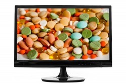 Pills on PC monitor